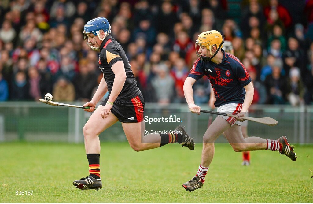 22 February 2014; Michael Casey, Ard Scoil Ris, in action against Dean Coleman, Scoil na Trionoide Naofa. Dr. Harty Cup Final, Scoil na Trionoide Naofa, Doon v Ard Scoil Ris, Limerick. Gaelic Grounds, Limerick. Picture credit: Diarmuid Greene / SPORTSFILE