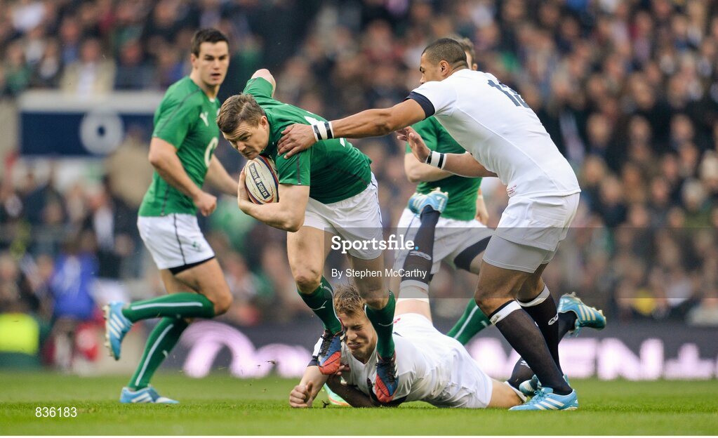 22 February 2014; Brian O'Driscoll, Ireland, is tackled by Luther Burrell, right, and Billy Twelvetrees, England. RBS Six Nations Rugby Championship, England v Ireland, Twickenham Stadium, Twickenham, London, England. Picture credit: Stephen McCarthy / SPORTSFILE