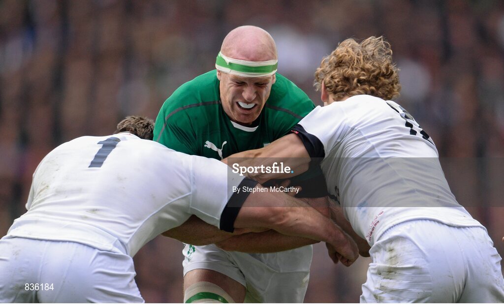 22 February 2014; Paul O'Connell, Ireland, is tackled by Joe Merler, left, and Billy Twelvetrees, England. RBS Six Nations Rugby Championship, England v Ireland, Twickenham Stadium, Twickenham, London, England. Picture credit: Stephen McCarthy / SPORTSFILE