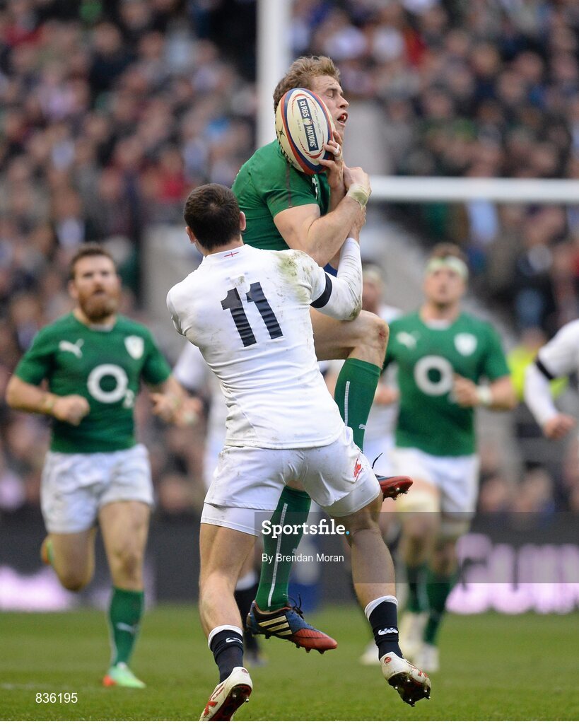 22 February 2014; Andrew Trimble, Ireland, is tackled by Jonny May, England. RBS Six Nations Rugby Championship, England v Ireland, Twickenham Stadium, Twickenham, London, England. Picture credit: Brendan Moran / SPORTSFILE