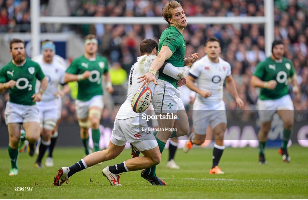 22 February 2014; Andrew Trimble, Ireland is tackled by Jonny May, England. RBS Six Nations Rugby Championship, England v Ireland. Twickenham Stadium, Twickenham, London, England. Picture credit: Brendan Moran / SPORTSFILE