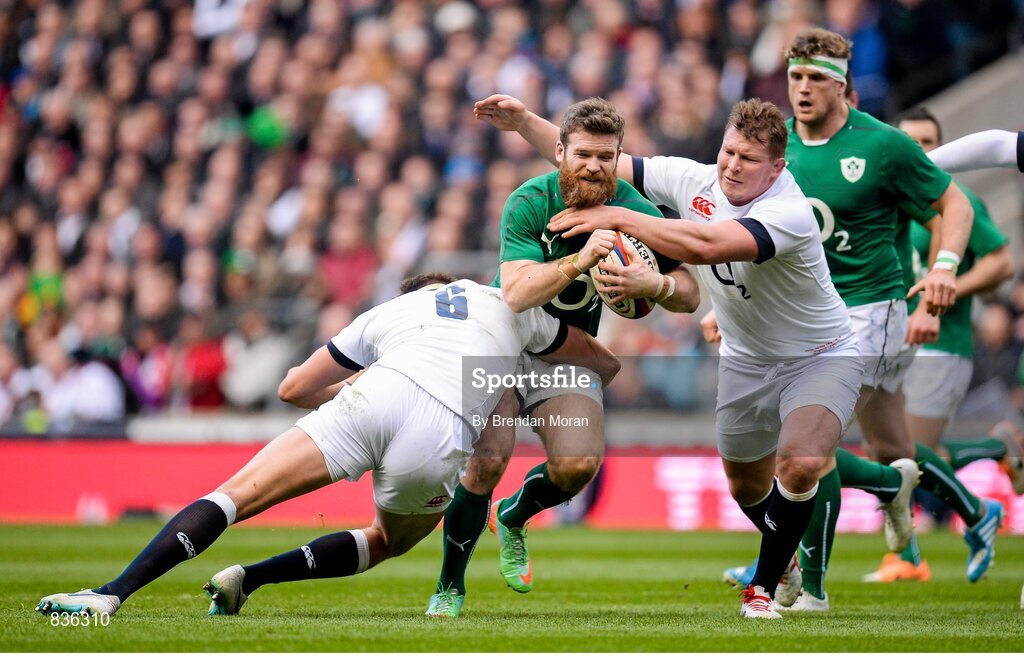 22 February 2014; Gordon D'Arcy, Ireland, is tackled by Tom Wood, left, and Dylan Hartley, England. RBS Six Nations Rugby Championship, England v Ireland. Twickenham Stadium, Twickenham, London, England. Picture credit: Brendan Moran / SPORTSFILE