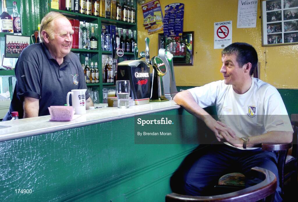 6 August 2004; Wexford hurler Liam Dunne with Phil Redmond in Redmond's pub. Raheen Duff, Co. Wexford. Picture credit; Brendan Moran / SPORTSFILE