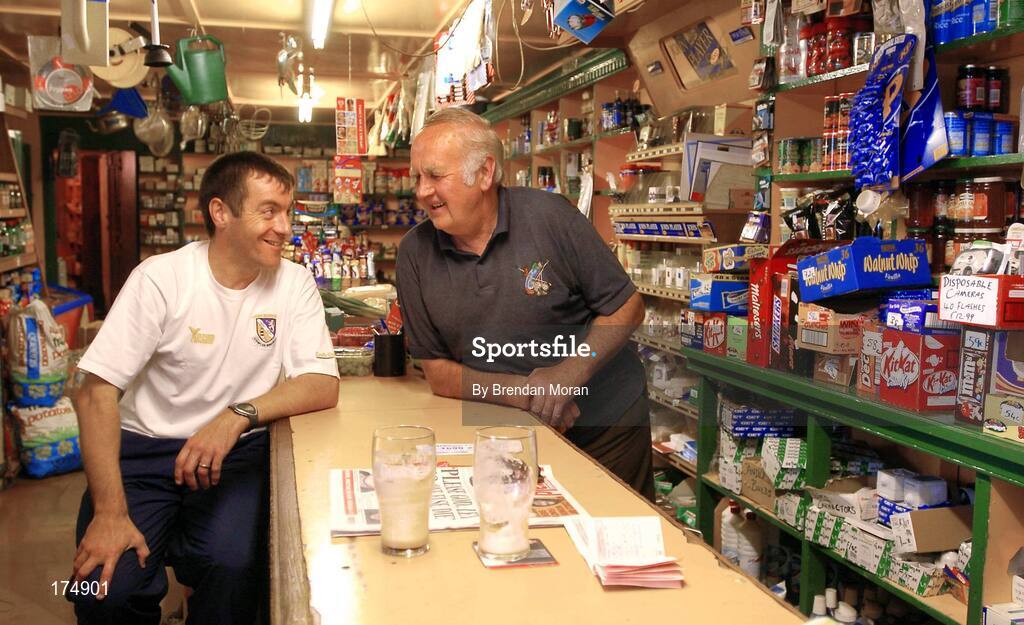 6 August 2004; Wexford hurler Liam Dunne with Phil Redmond in Redmond's pub. Raheen Duff, Co. Wexford. Picture credit; Brendan Moran / SPORTSFILE