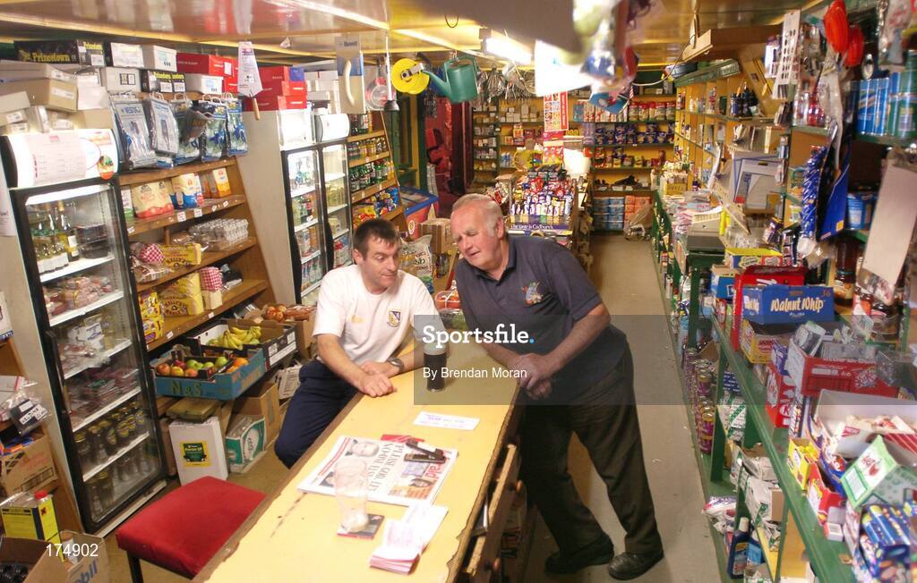 6 August 2004; Wexford hurler Liam Dunne with Phil Redmond in Redmond's pub. Raheen Duff, Co. Wexford. Picture credit; Brendan Moran / SPORTSFILE