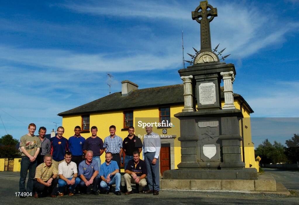 6 August 2004; Oulart-the-Ballagh men who won All-Ireland titles for Wexford pictured in front of the 1798 Rebellion Monument. Back row, from left, Rory Jacob, Tomas Dunne, Michael Jacob, Keith Rossiter, Darren Stamp, Paul Finn, Martin Storey and Tom Byrne. Front, from left, Christy Jacob, Liam Dunne, Mick Jacob, Sean Dunne and Jimmy Prendergast. Oulart-the-Ballagh, Co. Wexford. Picture credit; Brendan Moran / SPORTSFILE
