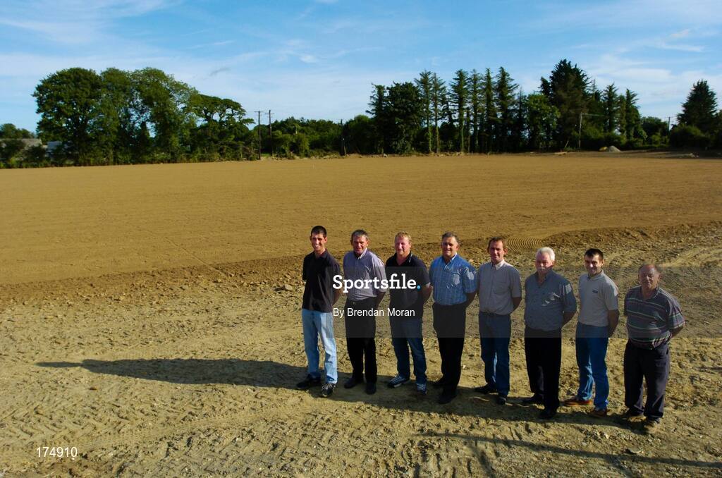 6 August 2004; Wexford hurler Liam Dunne, 2nd from right, pictured with, from left, Bartle Redmond, Bartle Sinnott, Martin Dempsey, Ned Evans, Tom Sinnott, Pat Dempsey and Johnny Hayden at the new Oulart-the-Ballagh GAA pitch, Co. Wexford. Picture credit; Brendan Moran / SPORTSFILE