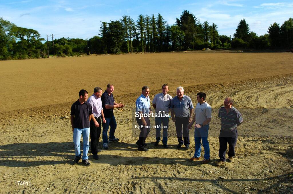 6 August 2004; Wexford hurler Liam Dunne, 2nd from right, pictured with, from left, Bartle Redmond, Bartle Sinnott, Martin Dempsey, Ned Evans, Tom Sinnott, Pat Dempsey and Johnny Hayden at the new Oulart-the-Ballagh GAA pitch, Co. Wexford. Picture credit; Brendan Moran / SPORTSFILE