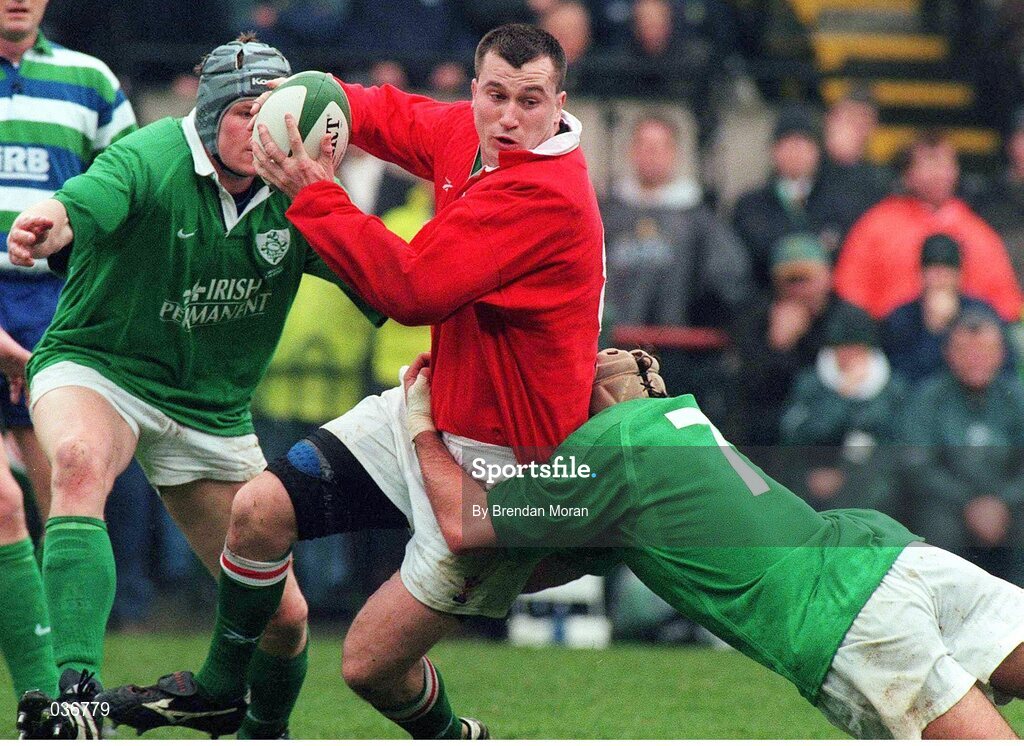 1 April 2000; Geraint Lewis, Wales, is tackled by Kieron Dawson, 7, Ireland. Six Nations Rugby International, Ireland v Wales, Lansdowne Road, Dublin. Picture credit: Brendan Moran / SPORTSFILE