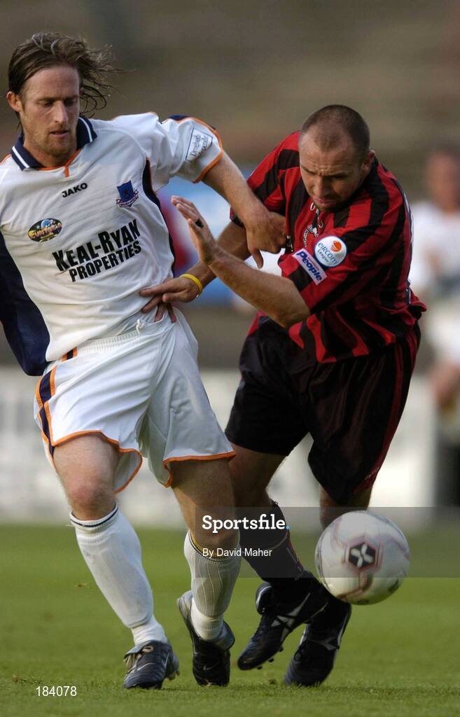 22 July 2005; Tony Grant, Bohemians, is tackled by Simon Webb, Drogheda United. eircom League, Premier Division, Bohemians v Drogheda United, Dalymount Park, Dublin. Picture credit; David Maher / SPORTSFILE