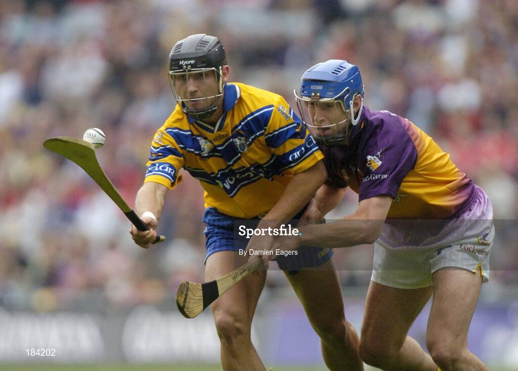 24 July 2005; Tony Carmody, Clare, is tackled by David O'Connor, Wexford. Guinness All-Ireland Senior Hurling Championship Quarter-Final, Wexford v Clare, Croke Park, Dublin. Picture credit; Damien Eagers / SPORTSFILE