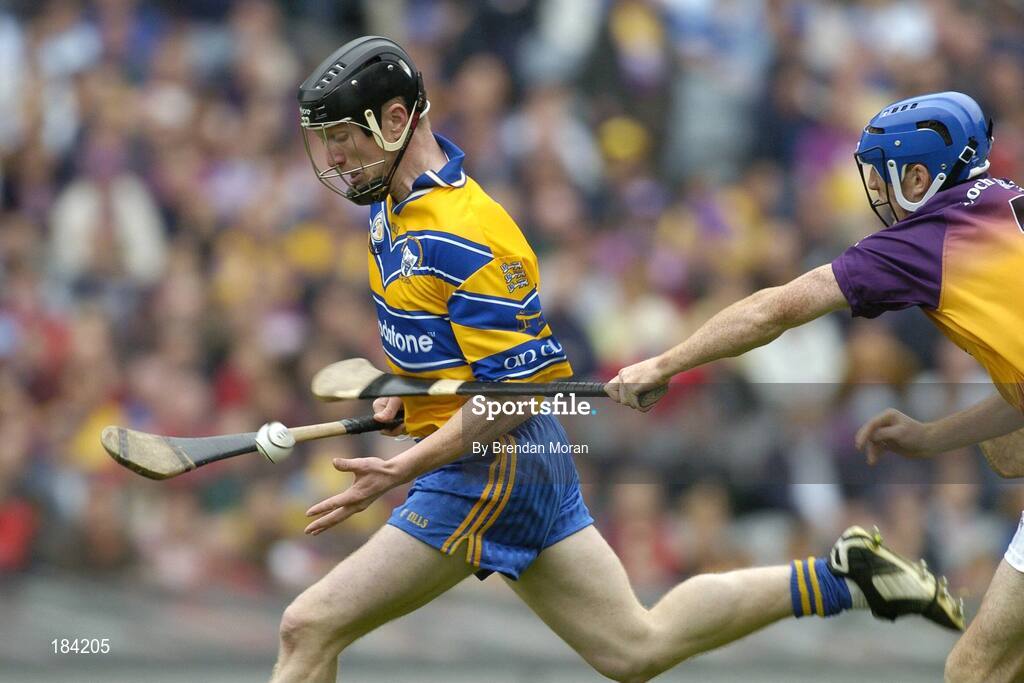 24 July 2005; Niall Gilligan, Clare, is tackled by Diarmuid Lyng, Wexford. Guinness All-Ireland Senior Hurling Championship Quarter-Final, Wexford v Clare, Croke Park, Dublin. Picture credit; Brendan Moran / SPORTSFILE