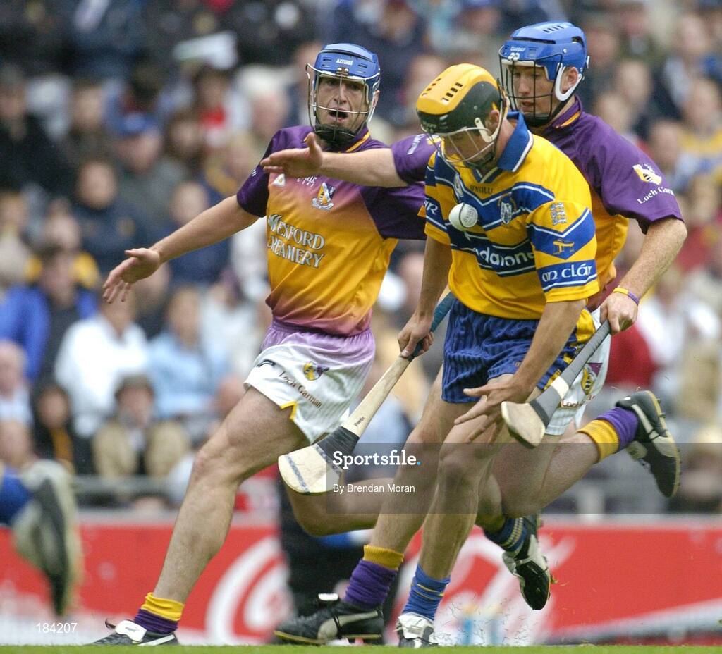 24 July 2005; Tony Griffin, Clare, in action against David O'Connor and Diarmuid Lyng, Wexford. Guinness All-Ireland Senior Hurling Championship Quarter-Final, Wexford v Clare, Croke Park, Dublin. Picture credit; Brendan Moran / SPORTSFILE
