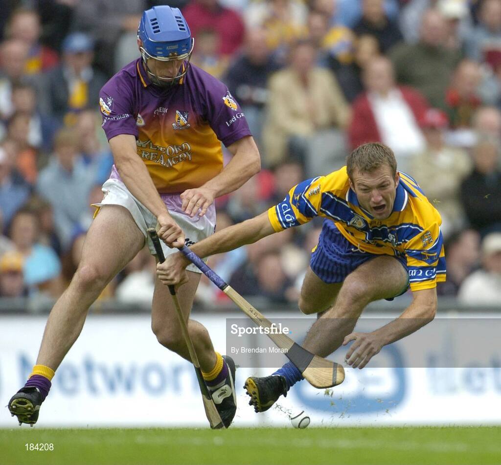 24 July 2005; Declan O'Rourke, Clare, in action against David O'Connor, Wexford. Guinness All-Ireland Senior Hurling Championship Quarter-Final, Wexford v Clare, Croke Park, Dublin. Picture credit; Brendan Moran / SPORTSFILE