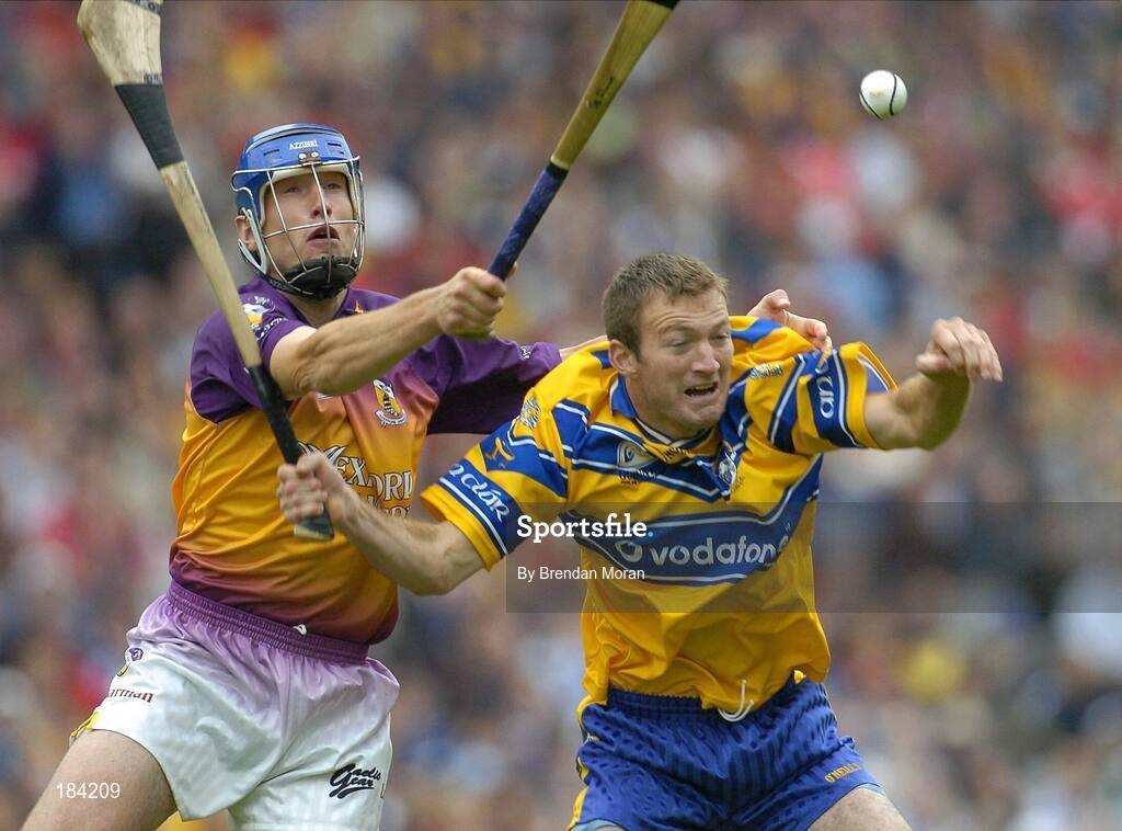 24 July 2005; Declan O'Rourke, Clare, is tackled by David O'Connor, Wexford. Guinness All-Ireland Senior Hurling Championship Quarter-Final, Wexford v Clare, Croke Park, Dublin. Picture credit; Brendan Moran / SPORTSFILE