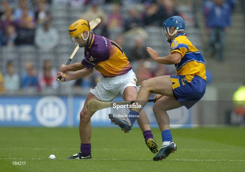 24 July 2005; Eoin Quigley, Wexford, in action against Alan Markham, Clare. Guinness All-Ireland Senior Hurling Championship Quarter-Final, Wexford v Clare, Croke Park, Dublin. Picture credit; Ray McManus / SPORTSFILE