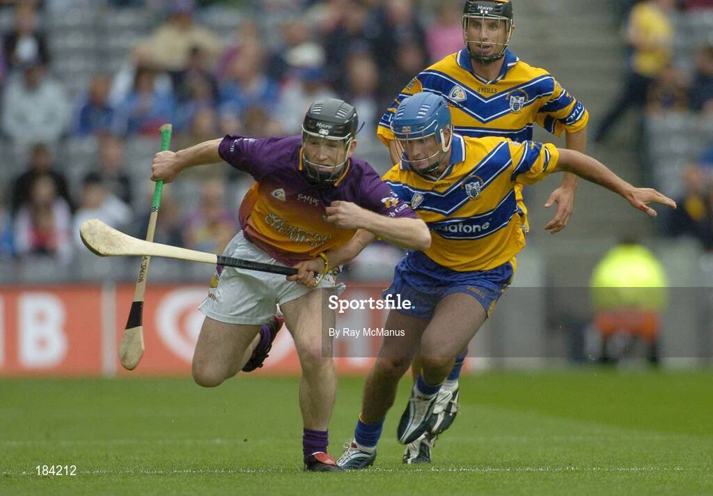 24 July 2005; Michael Jacob, Wexford, is tackled by Alan Markham, Clare. Guinness All-Ireland Senior Hurling Championship Quarter-Final, Wexford v Clare, Croke Park, Dublin. Picture credit; Ray McManus / SPORTSFILE