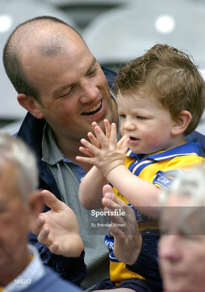 24 July 2005; Former Clare hurler Ollie Baker, with his son Senan, age 2, at the game. Guinness All-Ireland Senior Hurling Championship Quarter-Final, Wexford v Clare, Croke Park, Dublin. Picture credit; Brendan Moran / SPORTSFILE