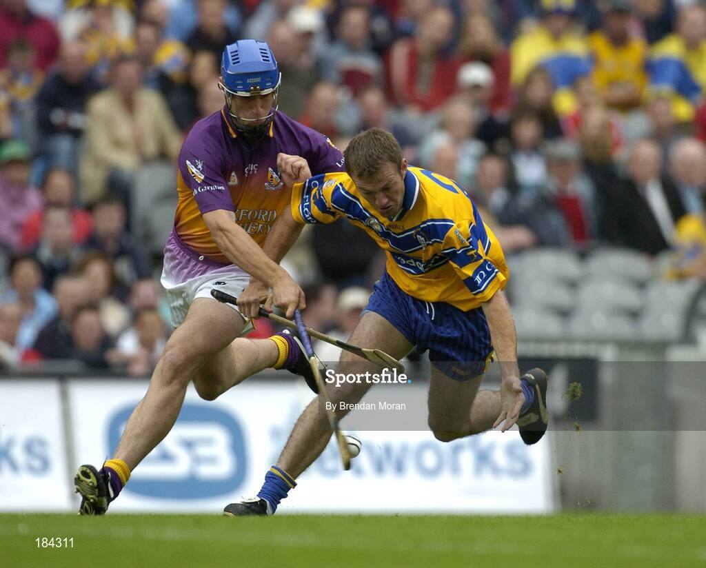 24 July 2005; Declan O'Rourke, Clare, in action against David O'Connor, Wexford. Guinness All-Ireland Senior Hurling Championship Quarter-Final, Wexford v Clare, Croke Park, Dublin. Picture credit; Brendan Moran / SPORTSFILE