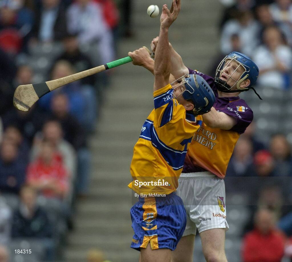 24 July 2005; Gerry O'Grady, Clare, in action against Rory Jacob, Wexford. Guinness All-Ireland Senior Hurling Championship Quarter-Final, Wexford v Clare, Croke Park, Dublin. Picture credit; Ray McManus / SPORTSFILE
