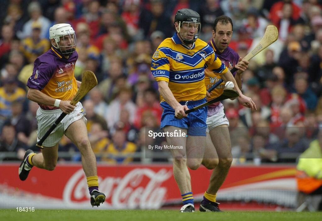 24 July 2005; Niall Gilligan, Clare, in action against Redmond Barry, left, and Darragh Ryan, Wexford. Guinness All-Ireland Senior Hurling Championship Quarter-Final, Wexford v Clare, Croke Park, Dublin. Picture credit; Ray McManus / SPORTSFILE