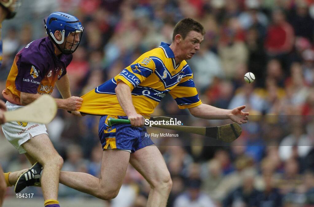 24 July 2005; Diarmuid McMahon, Clare, in action against Diarmuid Lyng, Wexford. Guinness All-Ireland Senior Hurling Championship Quarter-Final, Wexford v Clare, Croke Park, Dublin. Picture credit; Ray McManus / SPORTSFILE