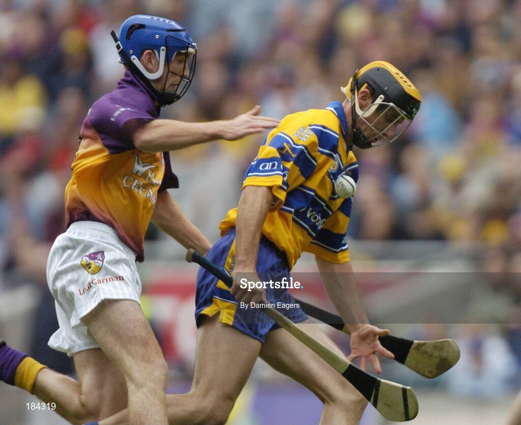 24 July 2005; Tony Griffin, Clare, in action against Diarmuid Lyng, Wexford. Guinness All-Ireland Senior Hurling Championship Quarter-Final, Wexford v Clare, Croke Park, Dublin. Picture credit; Damien Eagers / SPORTSFILE