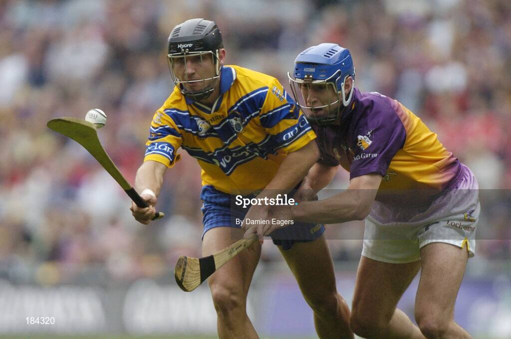24 July 2005; Tony Carmody, Clare, in action against David O'Connor, Wexford. Guinness All-Ireland Senior Hurling Championship Quarter-Final, Wexford v Clare, Croke Park, Dublin. Picture credit; Damien Eagers / SPORTSFILE