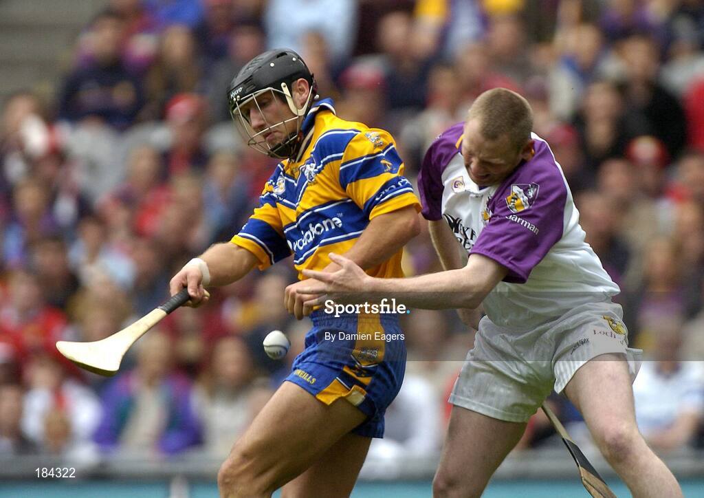 24 July 2005; Tony Carmody, Clare, in action against Damien Fitzhenry, Wexford. Guinness All-Ireland Senior Hurling Championship Quarter-Final, Wexford v Clare, Croke Park, Dublin. Picture credit; Damien Eagers / SPORTSFILE
