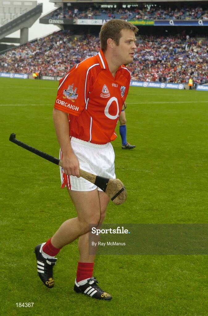 24 July 2005; Cork hurler Niall McCarthy walking in the parade sporting boots displaying an advertisement for an alcoholic beverage during the pre-match parade. Guinness All-Ireland Senior Hurling Championship Quarter-Final, Cork v Waterford, Croke Park, Dublin. Picture credit; Ray McManus / SPORTSFILE