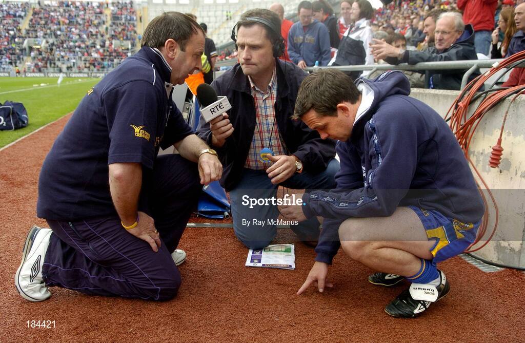 24 July 2005; Wexford manager Seamus Murphy, left, and Clare's David Fitzgerald, right, are interviewed by RTE's Martin Kiely. Guinness All-Ireland Senior Hurling Championship Quarter-Final, Wexford v Clare, Croke Park, Dublin. Picture credit; Ray McManus / SPORTSFILE