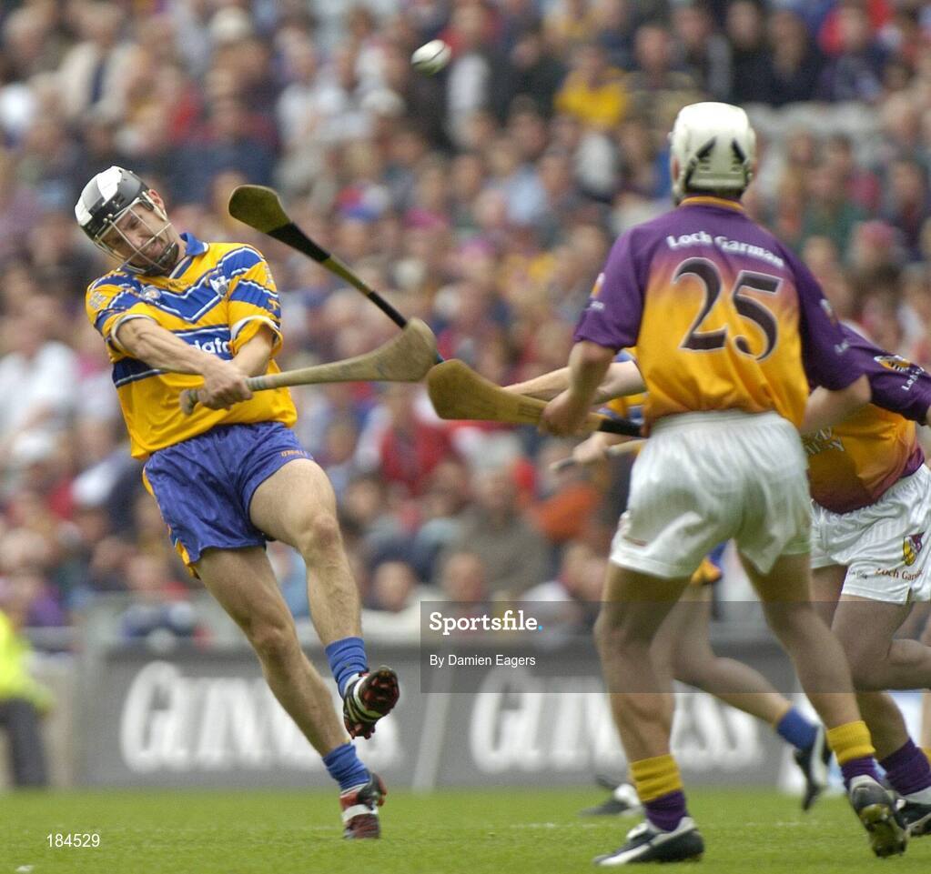24 July 2005; Gerry Quinn, Clare, in action against Redmond Barry, (25), Wexford. Guinness All-Ireland Senior Hurling Championship Quarter-Final, Wexford v Clare, Croke Park, Dublin. Picture credit; Damien Eagers / SPORTSFILE