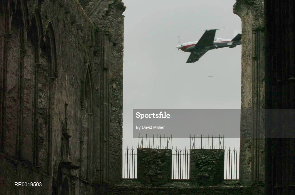 24 July 2005; Paul Bonhomme, Great Britain, in his Extra 330S aircraft, flies close to the Rock of Cashel during the Red Bull Air Race. Cashel, Co. Tipperary. Picture credit; David Maher / SPORTSFILE