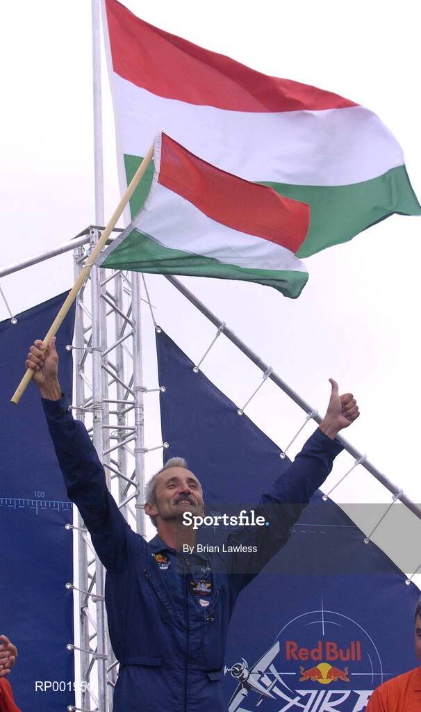 24 July 2005; Pilot Peter Besenyei, Hungry, celebrates on the podium after winning the Red Bull Air Race. Cashel, Co. Tipperary. Picture credit; Brian Lawless / SPORTSFILE