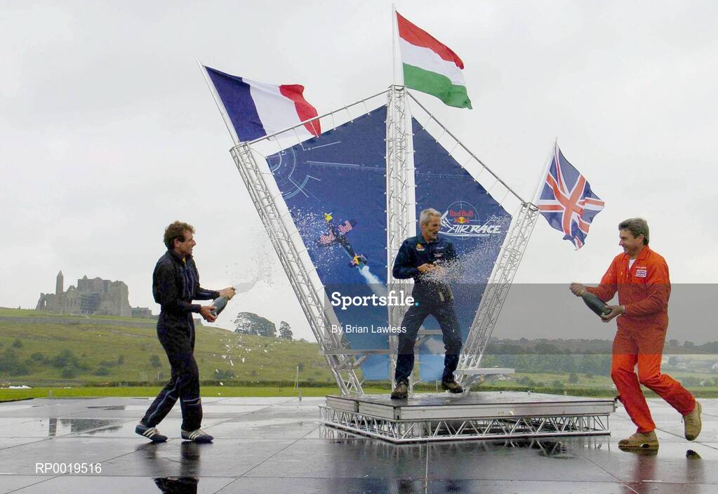 24 July 2005; First placed Peter Besenyei, of Hungry, centre, celebrates with second place Ivanoff Nicolas, of France, left, and third place Paul Bonhomme, of Great Britain, after he won the Red Bull Air Race. Cashel, Co. Tipperary. Picture credit; Brian Lawless / SPORTSFILE