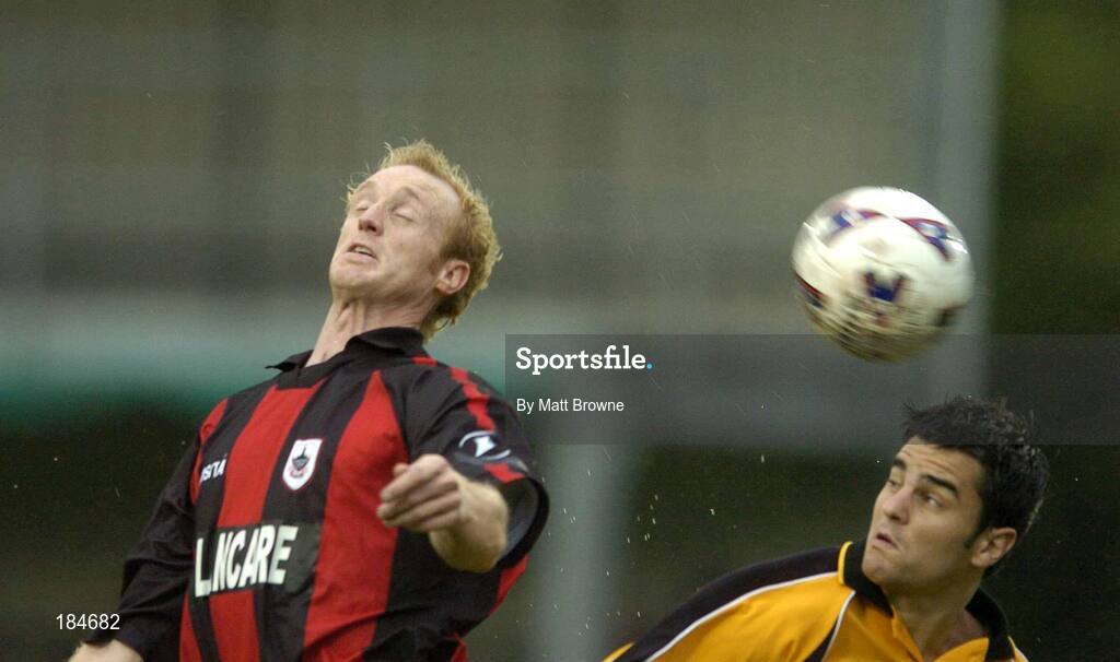 28 July 2005; Paul Keegan, Longford Town, in action against Martyn Giles, Carmarthen Town. UEFA Cup, First Qualifying Round, 2nd Leg, Carmarthen Town v Longford Town, Latham Park, Newtown, Wales. Picture credit; Matt Browne / SPORTSFILE