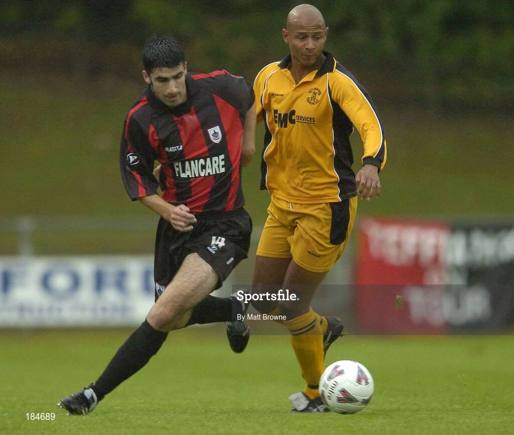 28 July 2005; Danny O'Connor, Longford Town, in action against Mark Dodds, Carmarthen Town. UEFA Cup, First Qualifying Round, 2nd Leg, Carmarthen Town v Longford Town, Latham Park, Newtown, Wales. Picture credit; Matt Browne / SPORTSFILE