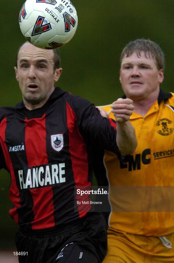 28 July 2005; Alan Kirby, Longford Town, in action against Martyn Giles, Carmarthen Town. UEFA Cup, First Qualifying Round, 2nd Leg, Carmarthen Town v Longford Town, Latham Park, Newtown, Wales. Picture credit; Matt Browne / SPORTSFIE