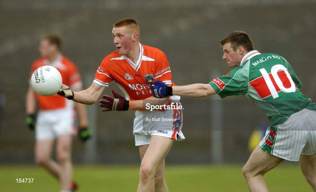 30 July 2005; Tony McClelland, Armagh, is tackled by Aidan Campbell, Mayo. All-Ireland Minor Football Quarter-Final, Mayo v Armagh, Dr. Hyde Park, Roscommon. Picture credit; Matt Browne / SPORTSFILE