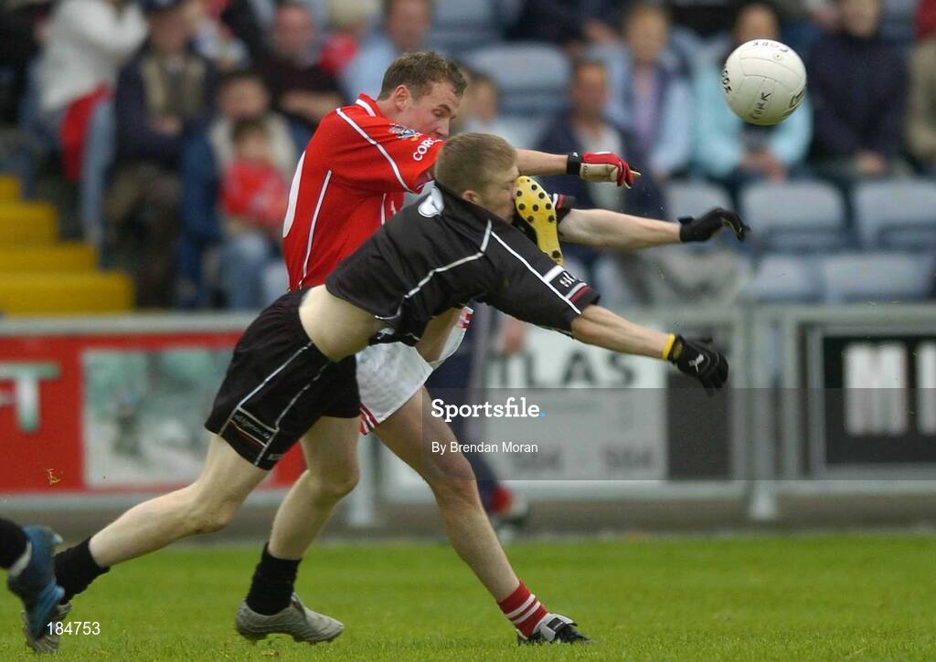 30 July 2005; James Masters, Cork, has his shot blocked by Johnny Martyn, Sligo. Bank of Ireland Football Championship qualifiers, Round 4. Cork v Sligo, O'Moore Park, Portlaoise, Co. Laois. Picture credit; Brendan Moran / SPORTSFILE