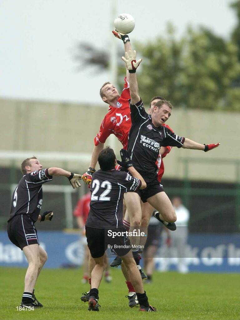 30 July 2005; Nicholas Murphy, Cork, contests a high ball with Noel McGuire, Sligo. Bank of Ireland Football Championship qualifiers, Round 4. Cork v Sligo, O'Moore Park, Portlaoise, Co. Laois. Picture credit; Brendan Moran / SPORTSFILE