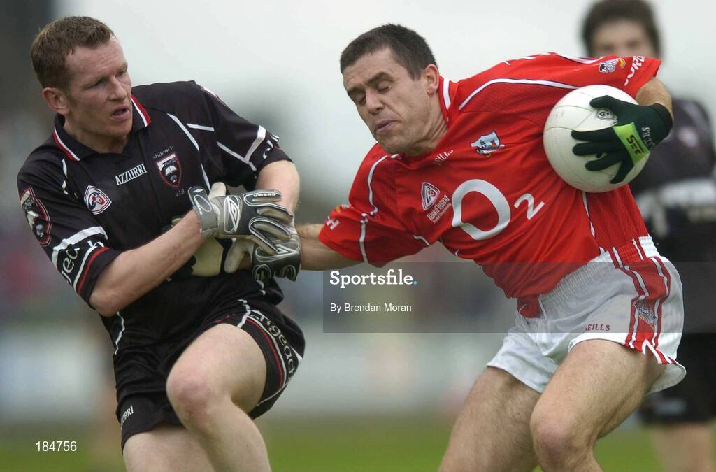 30 July 2005; Martin Cronin, Cork, is tackled by Mark Breheny, Sligo. Bank of Ireland Football Championship qualifiers, Round 4. Cork v Sligo, O'Moore Park, Portlaoise, Co. Laois. Picture credit; Brendan Moran / SPORTSFILE