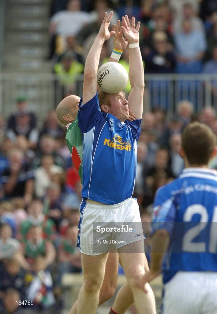 30 July 2005; Dermot McCabe, Cavan, in action against Shane Fitzmaurice, Mayo. Bank of Ireland Football Championship qualifer, Round 4. Mayo v Cavan, Dr. Hyde Park, Roscommon. Picture credit; Matt Browne / SPORTSFILE