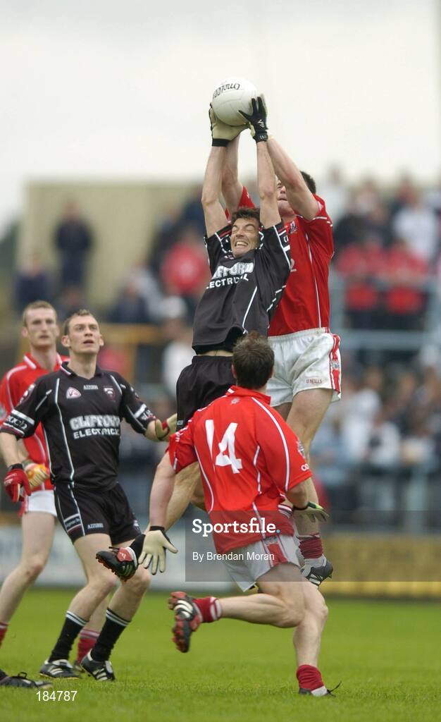 30 July 2005; Derek Kavanagh, Cork, and Dara McGarty, Sligo, contest a high ball. Bank of Ireland Football Championship qualifiers, Round 4. Cork v Sligo, O'Moore Park, Portlaoise, Co. Laois. Picture credit; Brendan Moran / SPORTSFILE