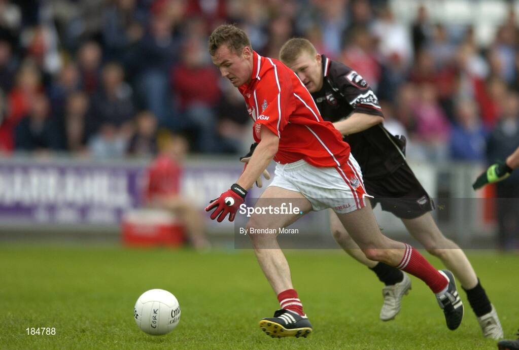 30 July 2005; James Masters, Cork, in action against Johnny Martyn, Sligo. Bank of Ireland Football Championship qualifiers, Round 4. Cork v Sligo, O'Moore Park, Portlaoise, Co. Laois. Picture credit; Brendan Moran / SPORTSFILE