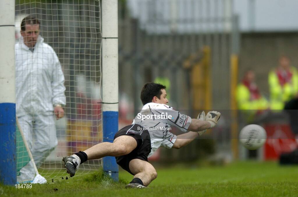 30 July 2005; Sligo goalkeeper Philip Greene saves a penalty from Cork's Brendan G O'Sullivan. Bank of Ireland Football Championship qualifiers, Round 4. Cork v Sligo, O'Moore Park, Portlaoise, Co. Laois. Picture credit; Brendan Moran / SPORTSFILE