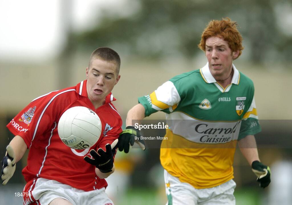 30 July 2005; Colm O'Neill, Cork is tackled by Diarmuid Horan, Offaly. All-Ireland Minor Football Championship Quarter Final, Cork v Offaly, O'Moore Park, Portlaoise, Co. Laois. Picture credit; Brendan Moran / SPORTSFILE