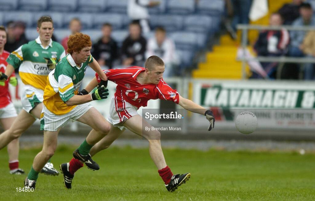 30 July 2005; Colm O'Neill, Cork is tackled by Diarmuid Horan, Offaly. All-Ireland Minor Football Championship Quarter Final, Cork v Offaly, O'Moore Park, Portlaoise, Co. Laois. Picture credit; Brendan Moran / SPORTSFILE