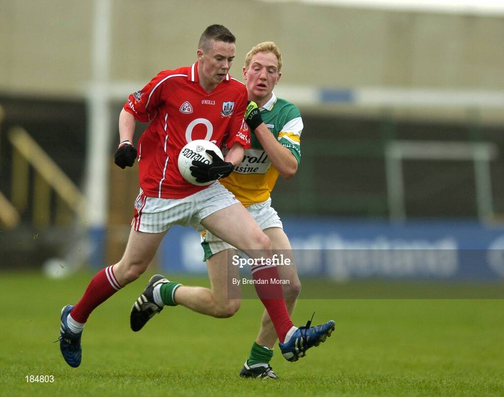 30 July 2005; Sean Kiely, Cork is tackled by Stephen Lonergan, Offaly. All-Ireland Minor Football Championship Quarter Final, Cork v Offaly, O'Moore Park, Portlaoise, Co. Laois. Picture credit; Brendan Moran / SPORTSFILE