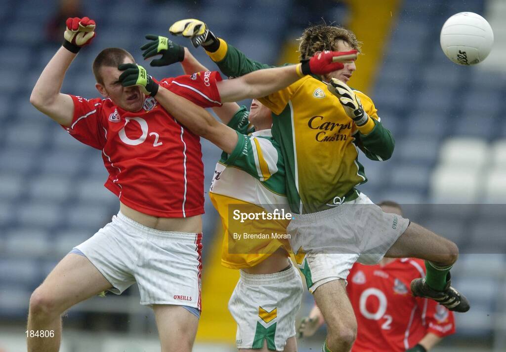 30 July 2005; Denis Crowley, Cork, knocks the ball into the Offaly net ahead of Richard Dalton and goalkeeper Dean Bracken. The goal was subsequently disallowed. All-Ireland Minor Football Championship Quarter Final, Cork v Offaly, O'Moore Park, Portlaoise, Co. Laois. Picture credit; Brendan Moran / SPORTSFILE